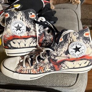 Converse High-Tops with Red and Black Graphic Design